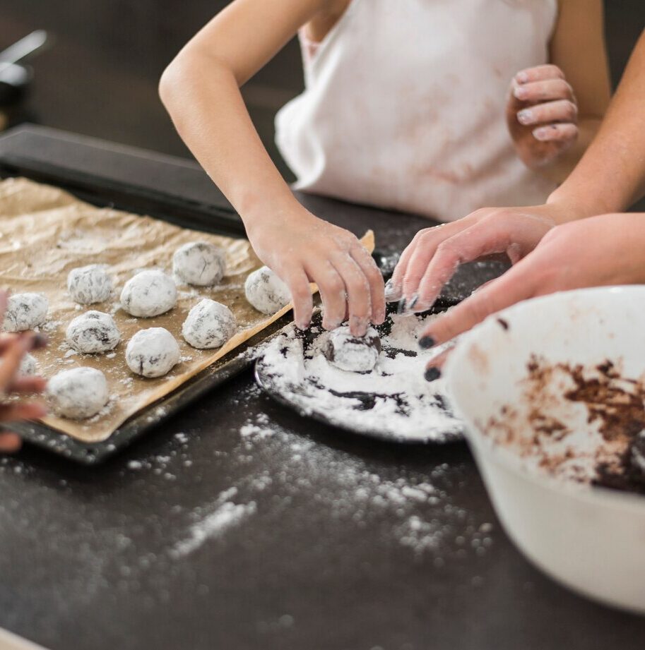two-sisters-mother-preparing-chocolate-cookie-kitchen_23-2148044385